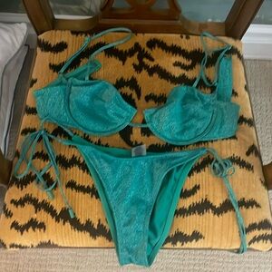 Triangl swimsuit medium top small bottom. Excellent condition.